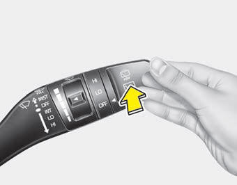 Kia Carnival: Rear window wiper and washer switch Kia Carnival: Rear window wiper and washer switch. Push the lever away from you to spray rear washer fluid and to run the rear wipers