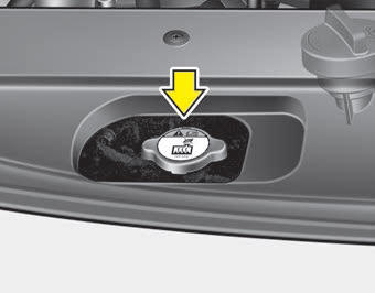 Kia Carnival: Checking the coolant level Kia Carnival: Checking the coolant level.