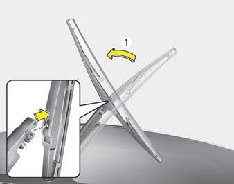 Kia Carnival: Blade replacement Kia Carnival: Blade replacement. 1. Raise the wiper arm and pull out the wiper blade assembly.