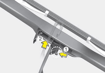Kia Carnival: Blade replacement Kia Carnival: Blade replacement. 2. Turn the wiper blade clip. Then lift up the blade clip.